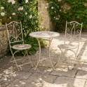 Set de Mesa Redonda y 2 Sillas en Forja Blanca y Ceramica Audyn